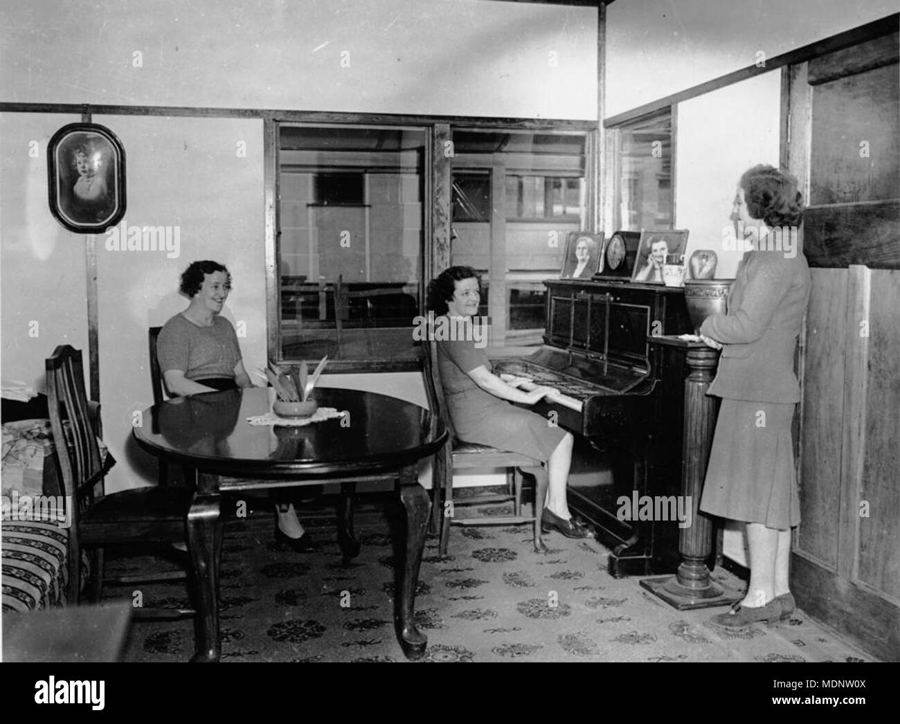Three women in a Rocklea war workers house Brisbane 1944 Stock Photo