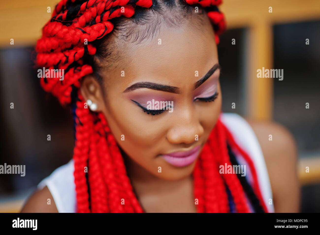 Fashionable African American Girl At Pink Pants And Red