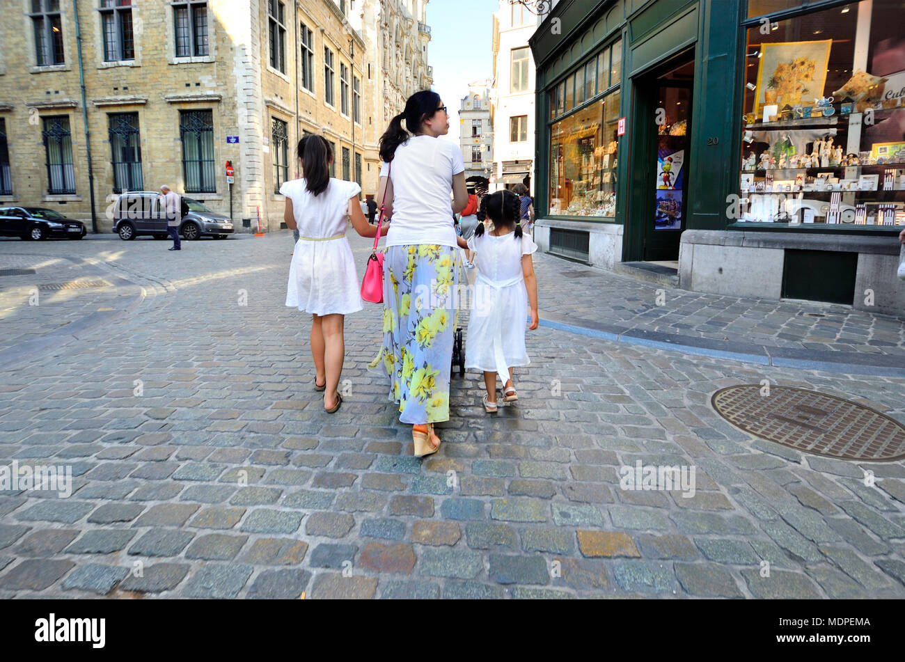 Brussels, Belgium. Asian family - mother and two daughters Stock Photo