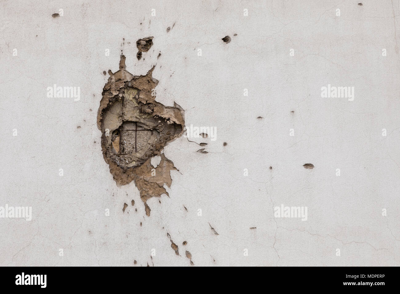 Bullet hole on building wall in Sarajevo Stock Photo