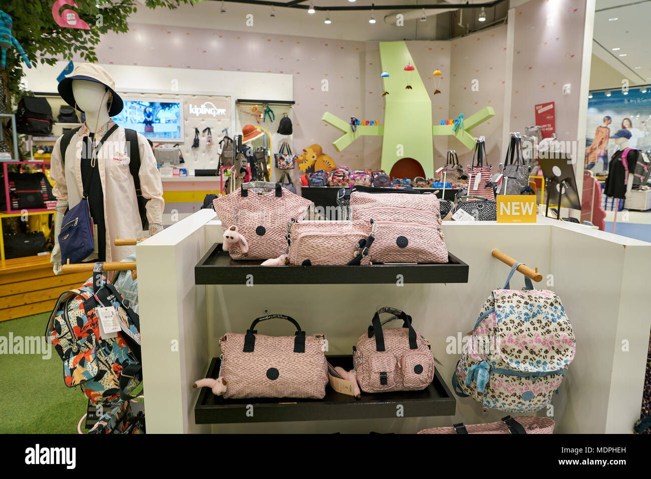 BUSAN, SOUTH KOREA - MAY 25, 2017: goods on display at Kipling store in Lotte Mall. Kipling is a fashion brand, that is sells handbags, backpacks, tot Stock -