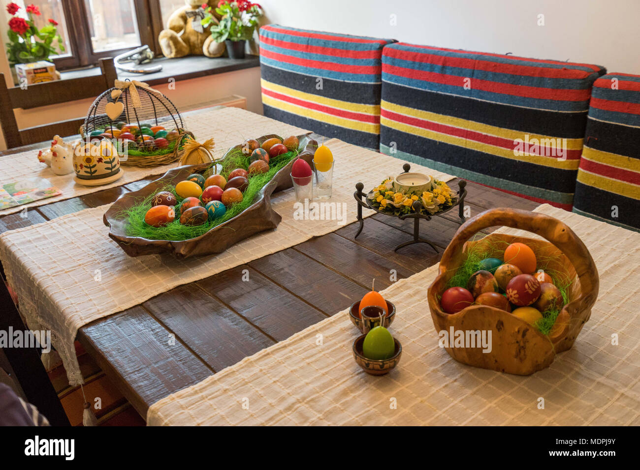 Easter table setting.Holiday Decorations on wooden table. Stock Photo