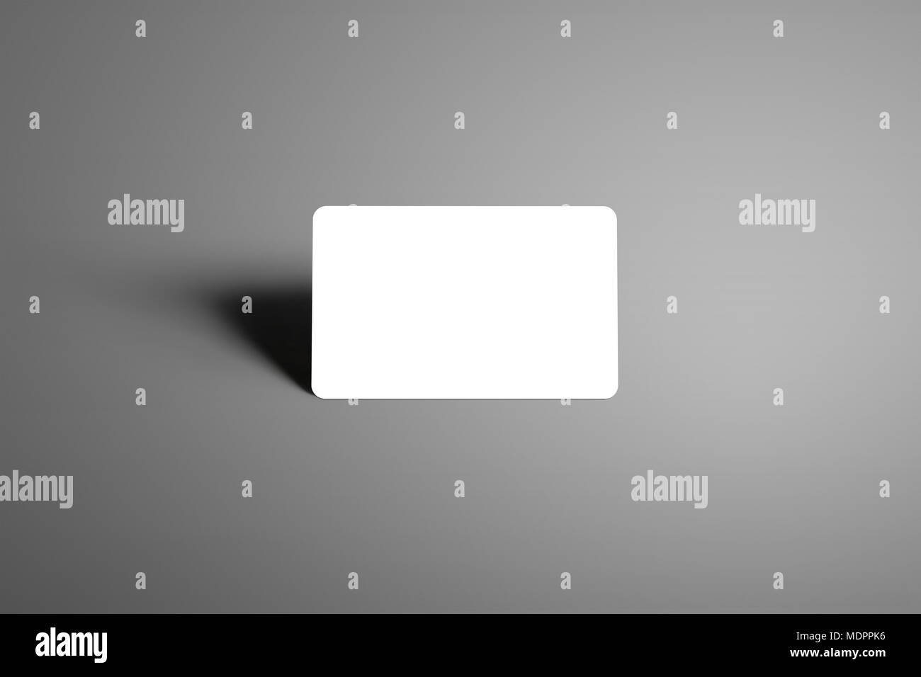 Blank mockup  one bank (gift) card on a studio gray background. Ready to used in your showcase. Stock Photo