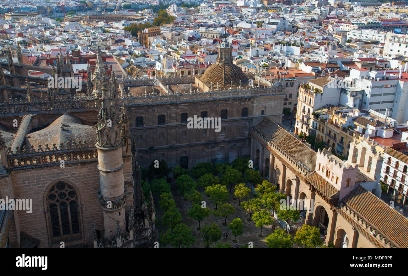 Aerial view from the top of Seville Cathedral, Spain. Seville Cathedral is the largest Gothic cathedral and the third-largest church in the world. Stock Photo