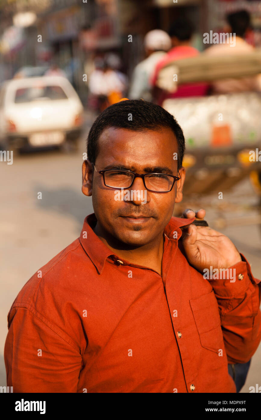 A Confident Businessman in Red Shirt Stock Photo