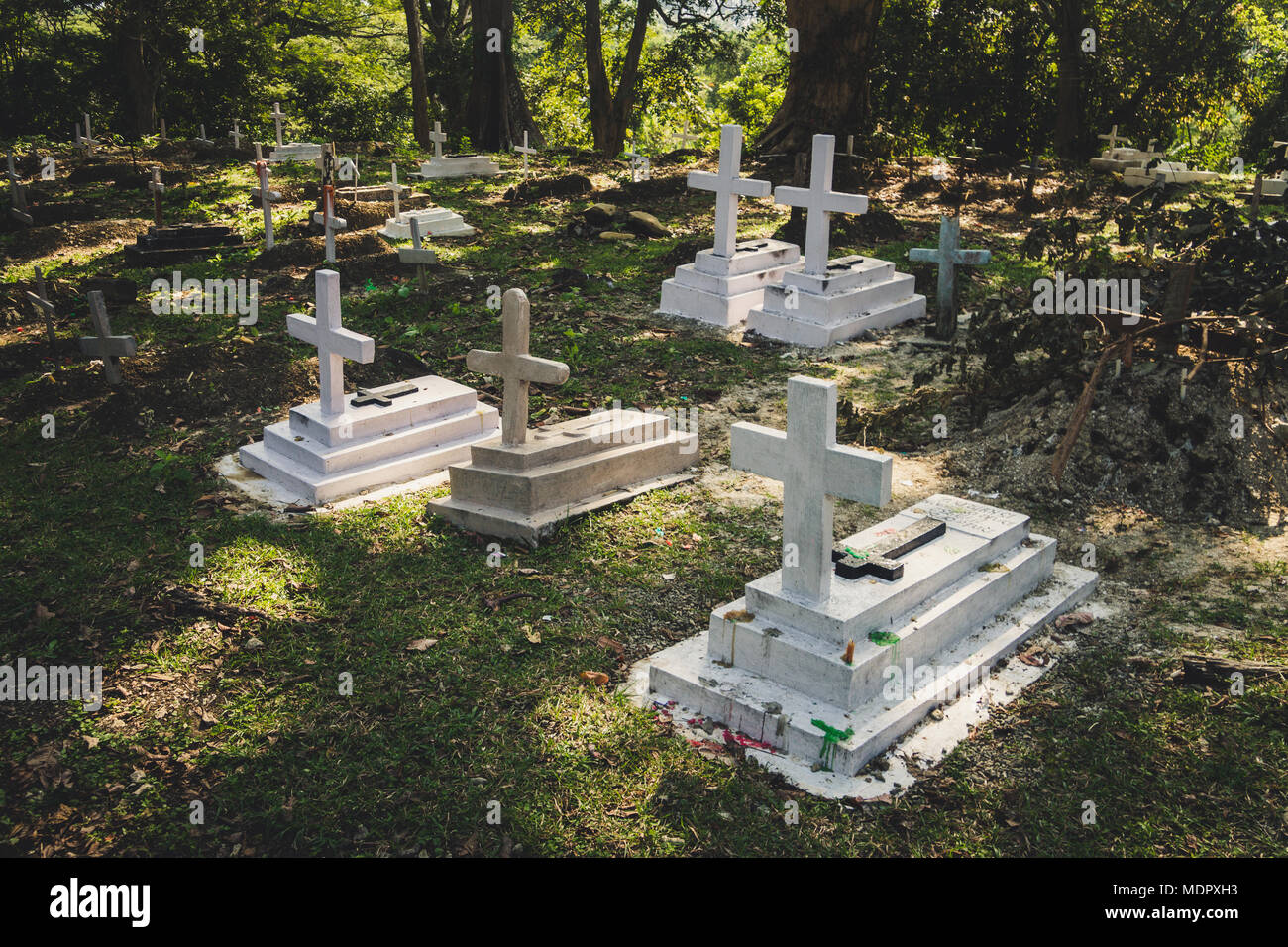 Old grave on traditional European cemetery in Slovakia. Aged cross tomb