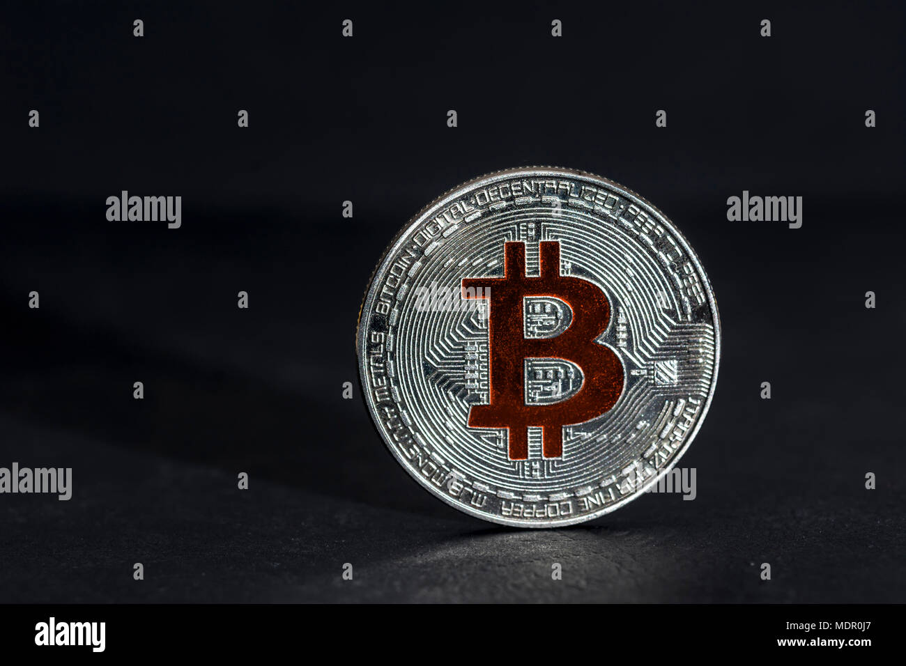 Close up of bitcoin, silver bitcoin, bitcoin with blurred background, digital currency, bitcoin mining, BTC modern currency exchange Stock Photo