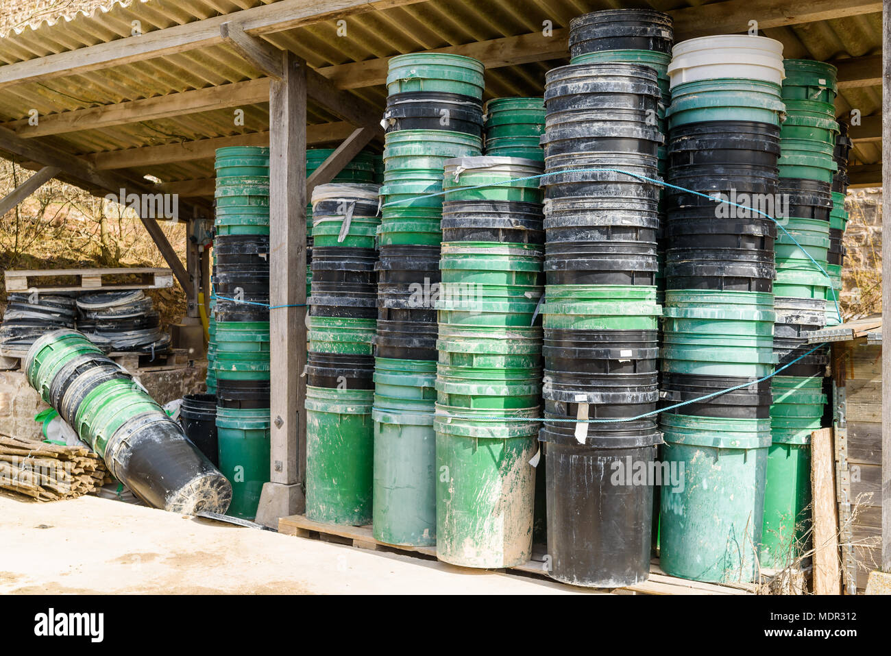 Outdoor storage of plastic barrels or buckets Stock Photo ...