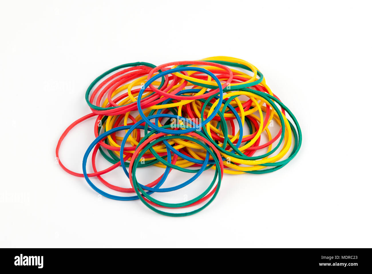 Collage of colorful rubber bands on white background Stock Photo - Alamy