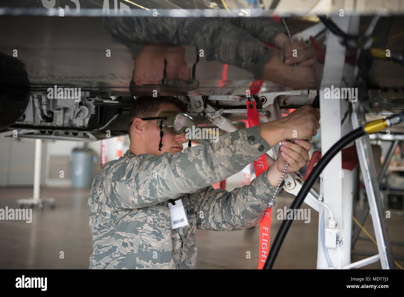 Airman Christopher Rines, 364th Training Squadron student, safety wires ...