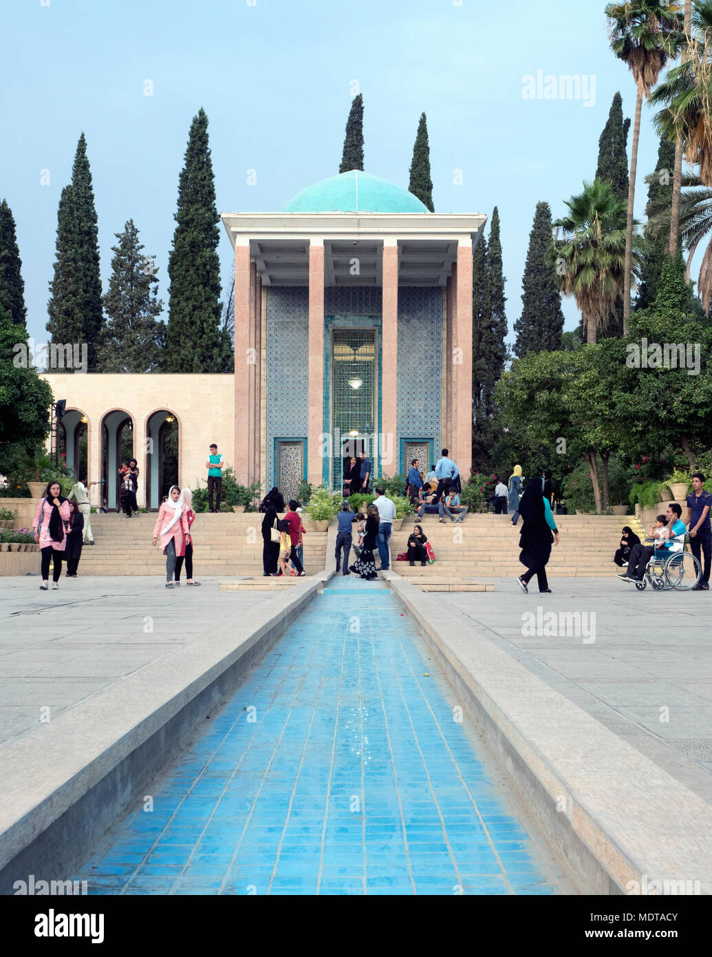 Tourists at the Tomb of Saadi, a mausoleum dedicated to the 13th century Persian poet. Shiraz, Iran Stock Photo