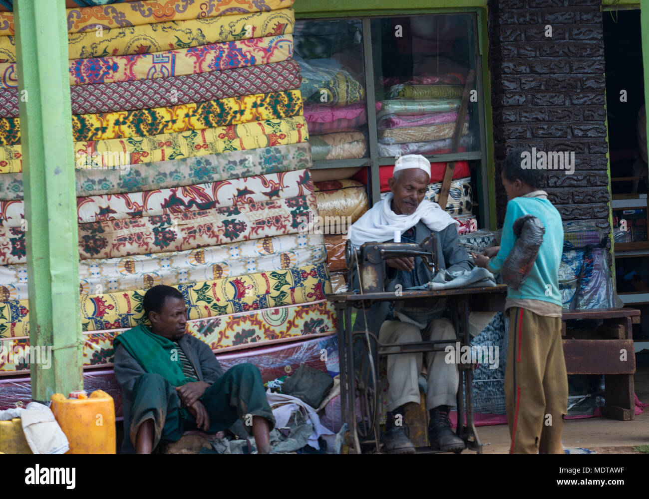 A street tailor workshop, and mattress  shop somewhere in Oromia, Ethiopia Stock Photo