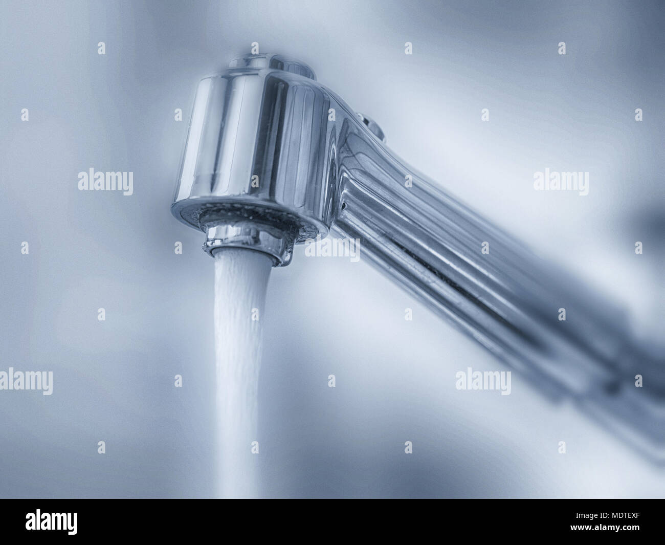 Clean water from the tap Stock Photo