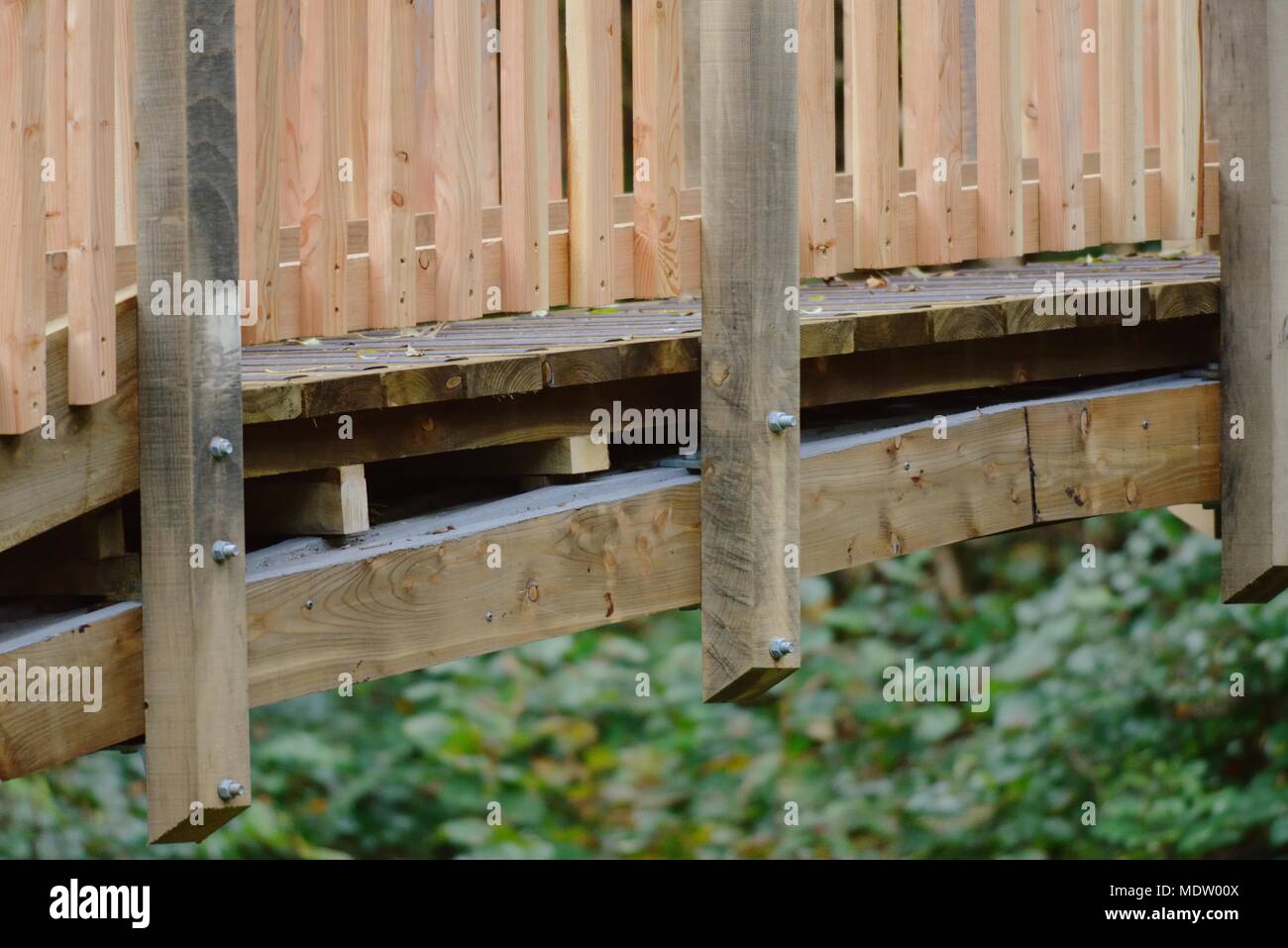 26 in a series of 32, building a timber footbridge, side view detail, deck supports. Stock Photo