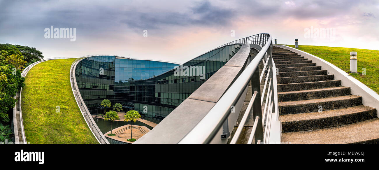 SINGAPORE - October 24, 2016: Modern architectural building of Nanyang Technological University in Singapore. Citylandscape Nanyang Technological Univ Stock Photo