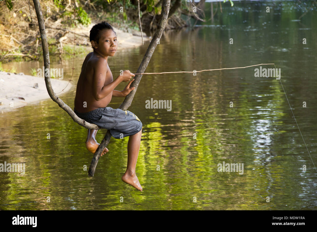 Yanomami Indians with improvised fishing rod bamboo or bamboo Stock Photo Alamy