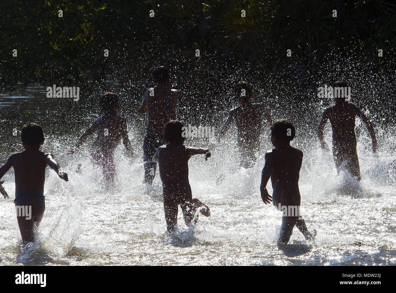 Kalapalo children playing in Lake Village Aiha Ipa - Indigena Parque do Xingu - MT Stock Photo