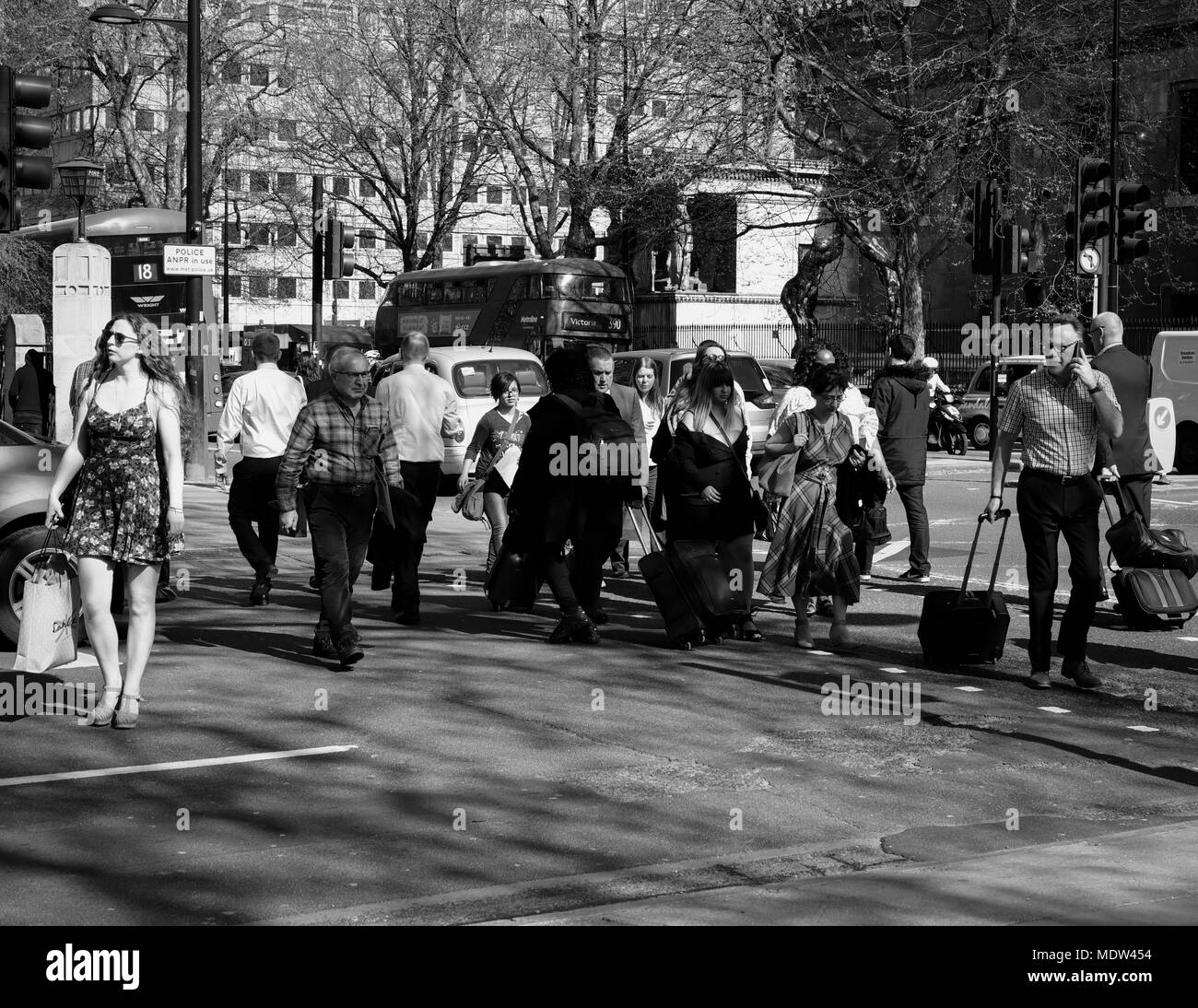 Man walking ahead of woman Black and White Stock Photos & Images - Alamy