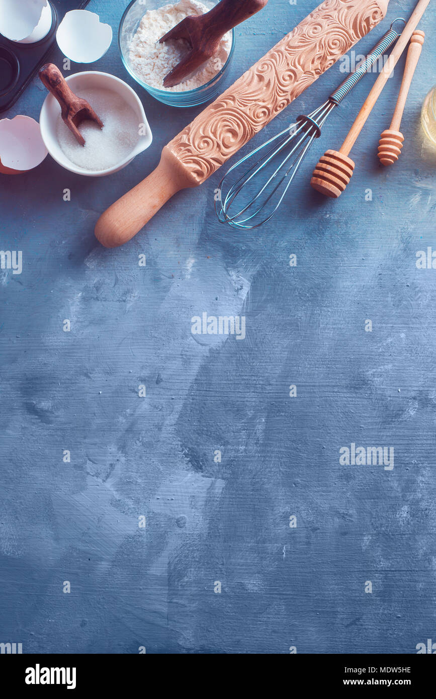 Baking tools and ingredients from above. Rolling pin, honey spoons, a ...