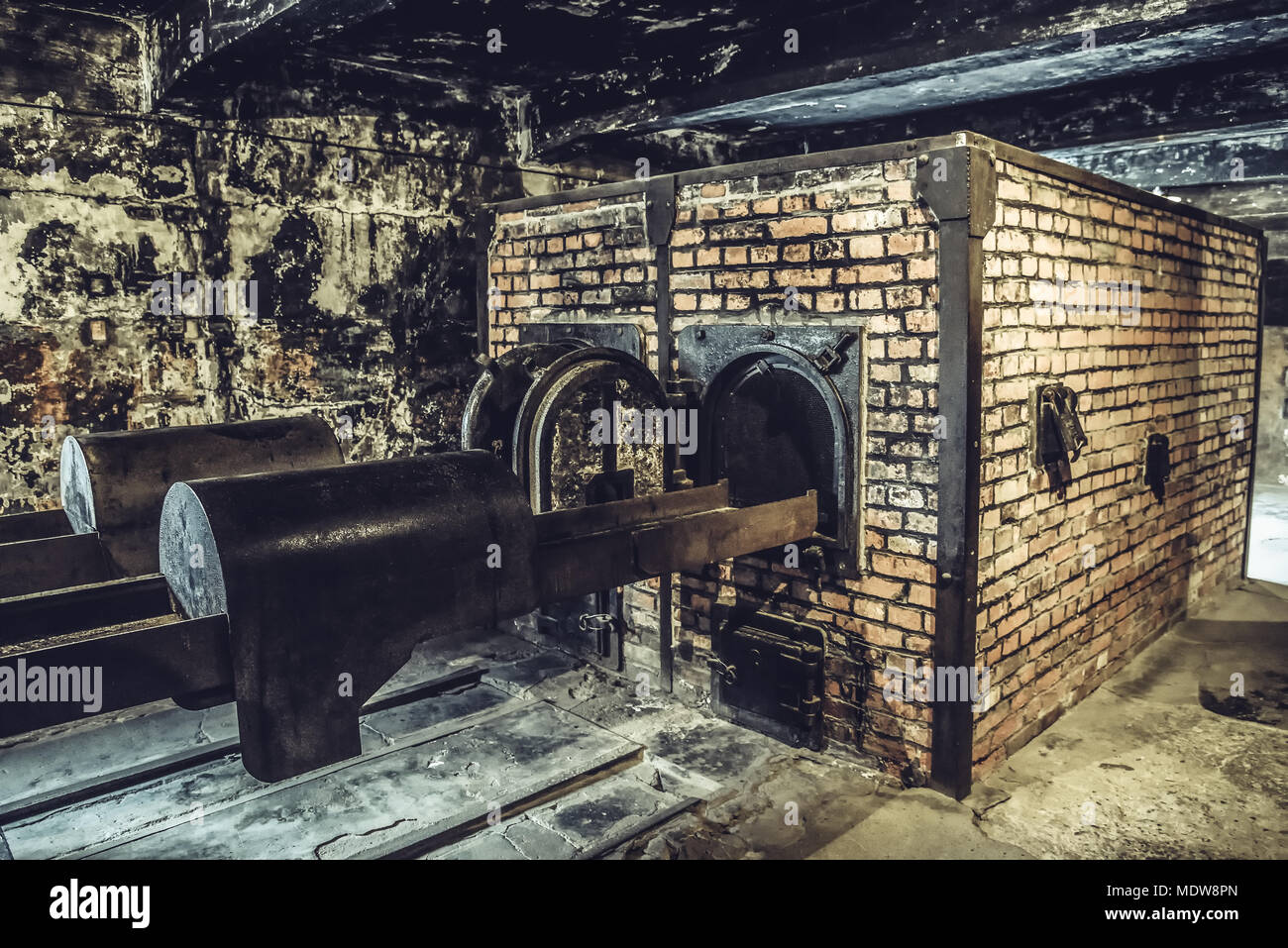 Oswiecim / Poland - 02.15.2018: Crematorium stove in dark basement in  Auschwitz Museum. Stock Photo