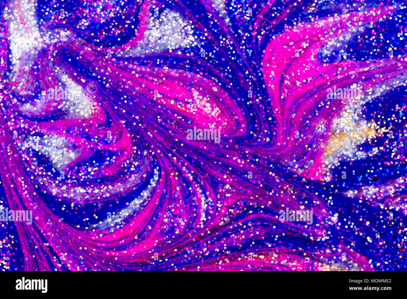 Abstract silver gold pink and blue liquid glitter paint swirl background Stock Photo 180659082