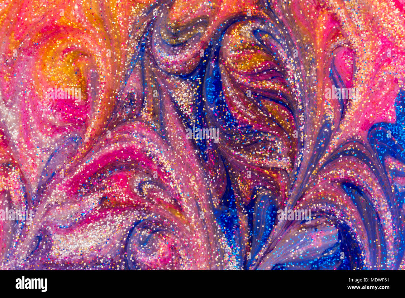 Abstract silver gold pink and blue liquid glitter paint swirl