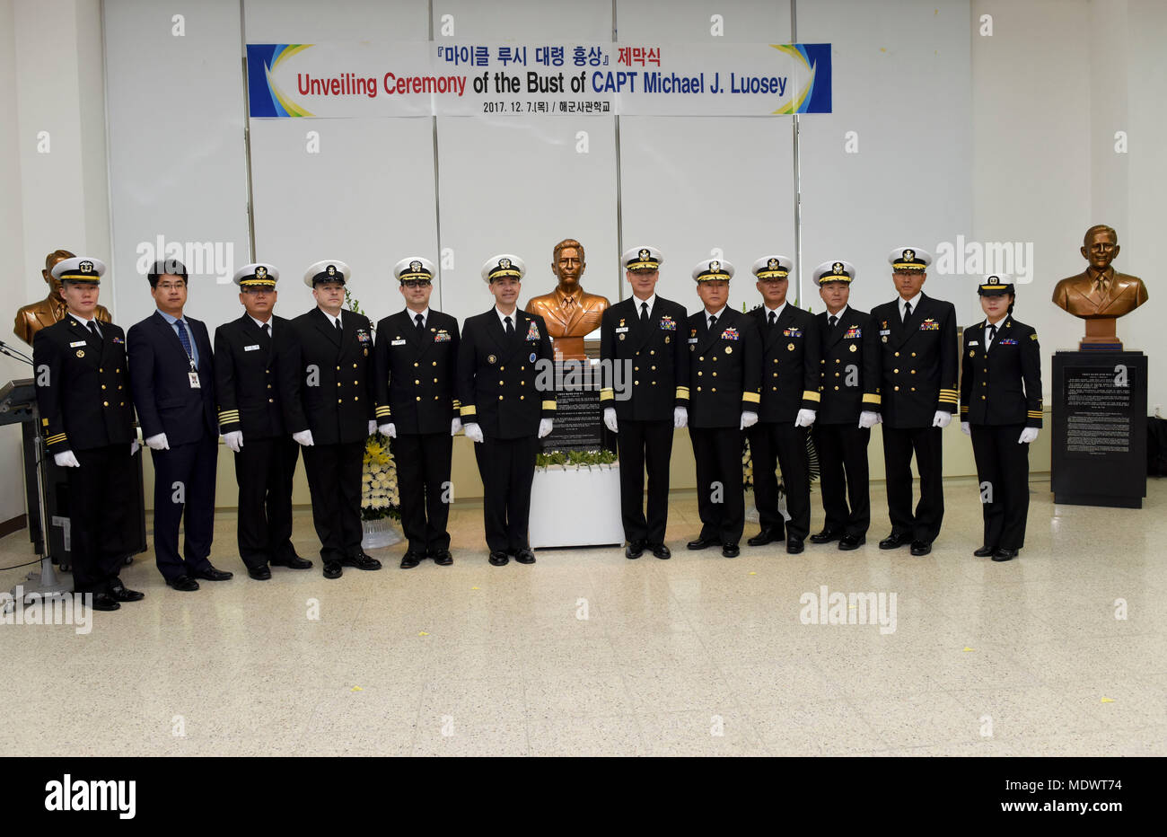 171207-N-TB148-089 CHINHAE, Republic of Korea (Dec. 07, 2017) Rear Adm. Brad Cooper, commander, U.S. Naval Forces Korea (CNFK), attends the unveiling of the Capt. Michael Lousey memorial bust unveiling ceremony at Republic of Korea (ROK) Naval Academy in Chinhae. CNFK is the U.S. Navy’s representative in the ROK, providing leadership and expertise in naval matters to improve institutional and operational effectiveness between the two navies and to strengthen collective security efforts in Korea and the region. (U.S. Navy photo by Mass Communication Specialist Seaman William Carlisle) Stock Photo