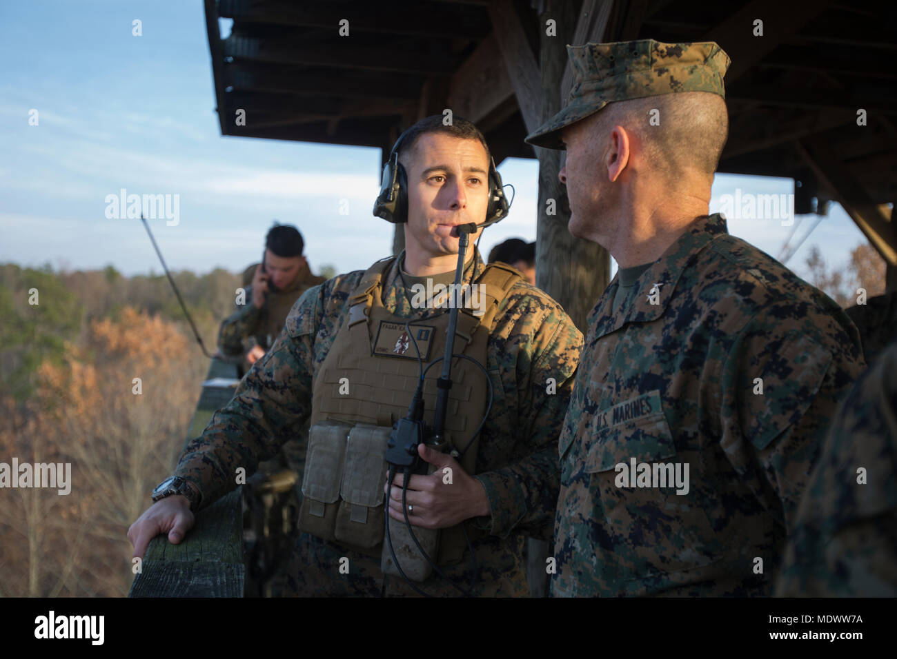 Maj. Gen. John Love speaks with Capt. Edward Fagan during his visit with Marines and sailors with 2nd Battalion, 8th Marine Regiment during the unit’s deployment for training exercise at Fort A.P. Hill, Va., Dec. 4, 2017. The visit allowed Love to observe the battalion’s readiness for an upcoming deployment to Japan. Love is the commanding general of 2nd Marine Division. (U.S. Marine Corps photo by Lance Cpl. Ashley McLaughlin) Stock Photo