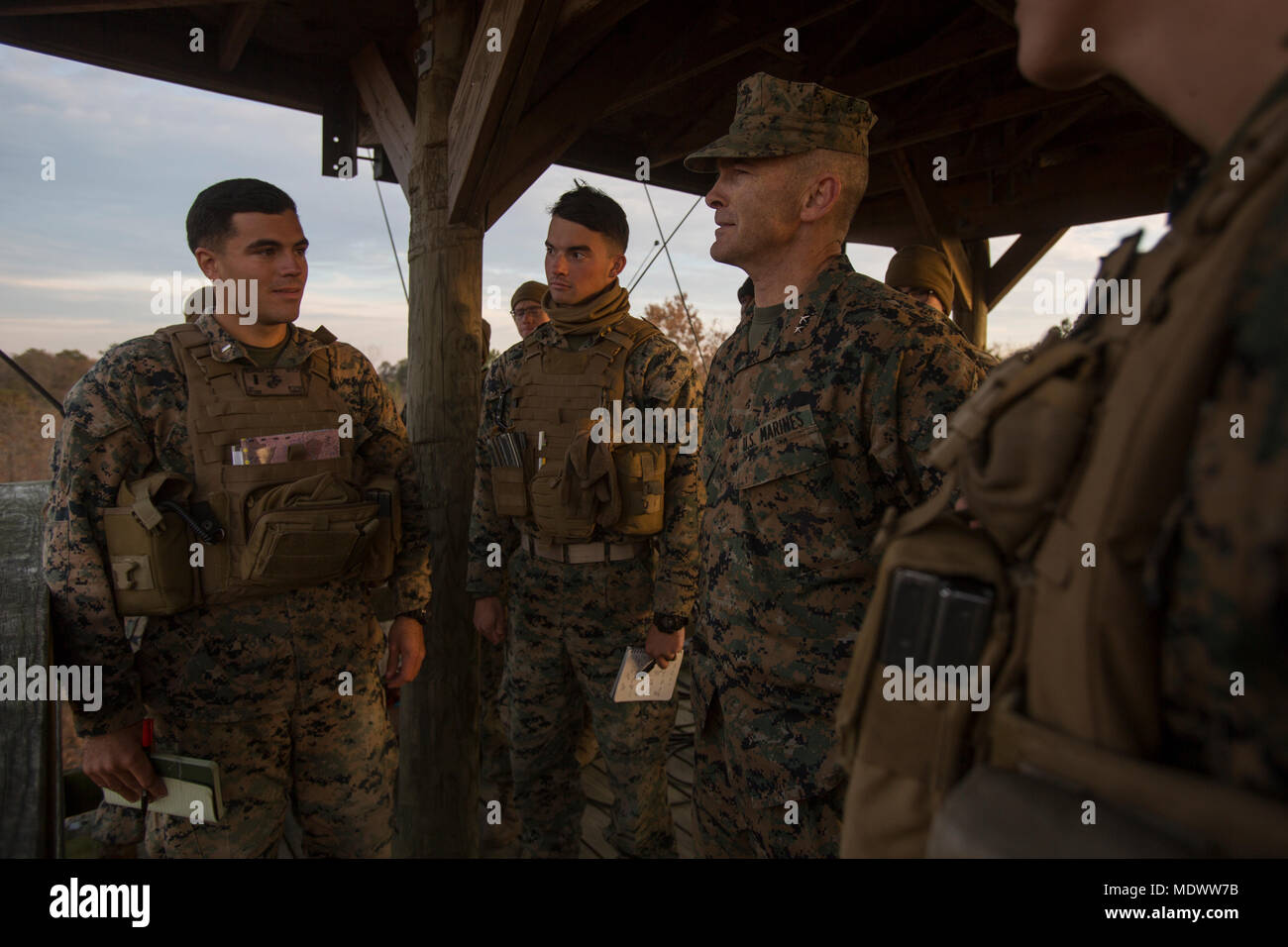 Maj. Gen. John Love speaks with Marines during his visit with 2nd Battalion, 8th Marine Regiment during the unit’s deployment for training exercise at Fort A.P. Hill, Va., Dec. 4, 2017. The visit allowed Love to observe the battalion’s readiness for an upcoming deployment to Japan. Love is the commanding general of 2nd Marine Division. (U.S. Marine Corps photo by Lance Cpl. Ashley McLaughlin) Stock Photo