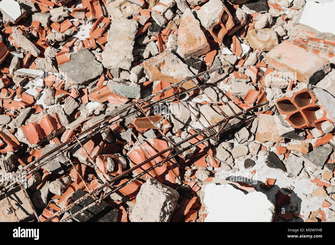 Debris of a demolished wall, demolition junk, broken concrete and