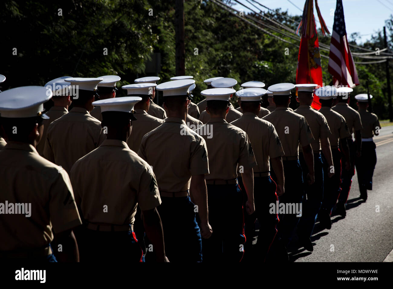 U.S. Marines with 3rd Battalion, 3rd Marine Regiment, march in the Waimanalo Christmas Parade