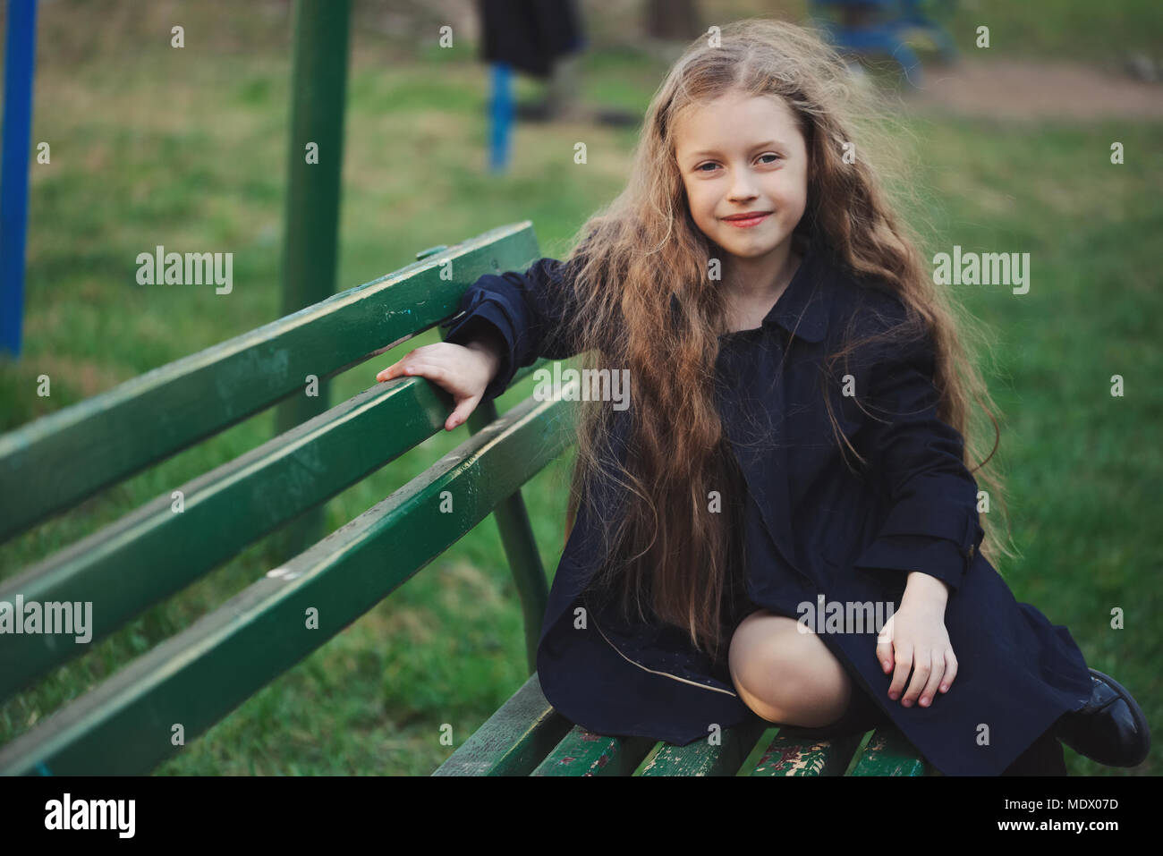 portrait of young girl in black coat Stock Photo - Alamy