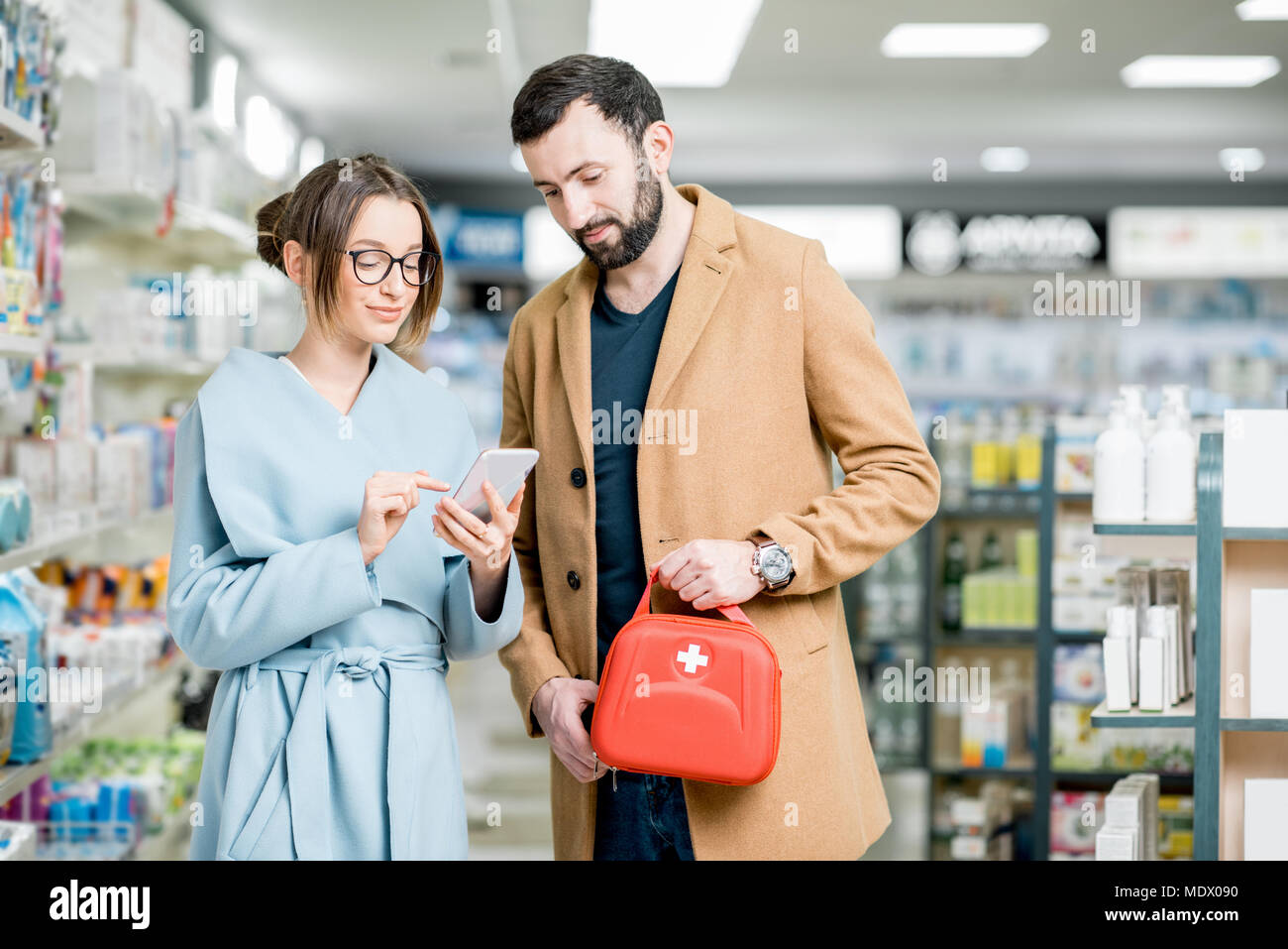 Couple in the pharmacy store Stock Photo
