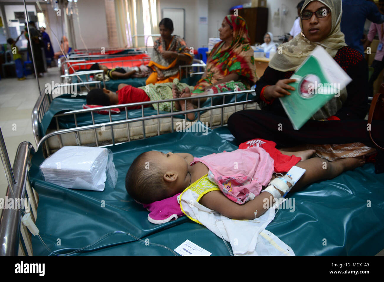 Bangladeshi children suffering from diarrhea with their mother at The