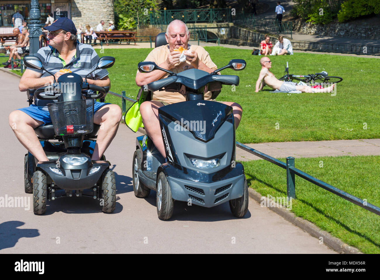 Bournemouth, Dorset, UK. 20th April 2018. UK weather: pensioners on mobility scooters enjoying their lunch in Bournemouth Gardens on a hot sunny day. Credit: Carolyn Jenkins/Alamy Live News Stock Photo