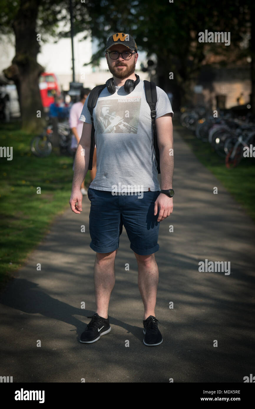 Michael Zyla poses for photos as part of a series showing men wearing