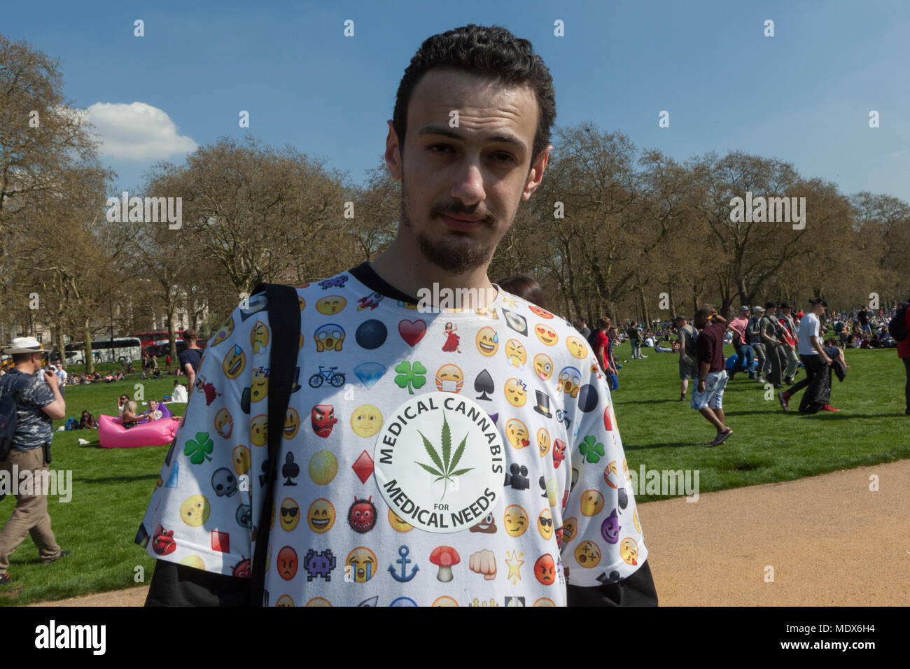 Hyde Park, London UK 20 April, 2018. Hundreds of pot smokers turn out for the annual 420 Day Rally in Hyde Park, London to party and smoke cannabis under the watchful eye of the local police. The term “420” has become universally known as the code word for smoking pot, attributed to a group of teens in San Rafael, California who coined the phrase in 1971 as slang for toking up at 4:20pm, it has now become a world-wide phenomenon. Credit: Steve Parkins/Alamy Live News Stock Photo