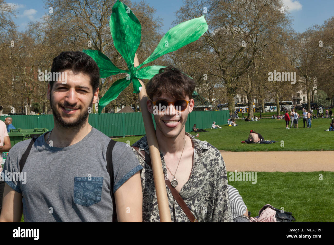 Hyde Park, London UK 20 April, 2018. Hundreds of pot smokers turn out for the annual 420 Day Rally in Hyde Park, London to party and smoke cannabis under the watchful eye of the local police. The term “420” has become universally known as the code word for smoking pot, attributed to a group of teens in San Rafael, California who coined the phrase in 1971 as slang for toking up at 4:20pm, it has now become a world-wide phenomenon. Credit: Steve Parkins/Alamy Live News Stock Photo