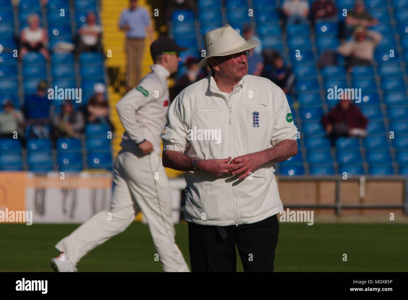 Leeds, England, 20 April 2018. Nick Cook umpiring in the Yorkshire against Nottinghamshire county championship match at Emerald Headingley, Leeds. Credit: Colin Edwards/Alamy Live News. Stock Photo