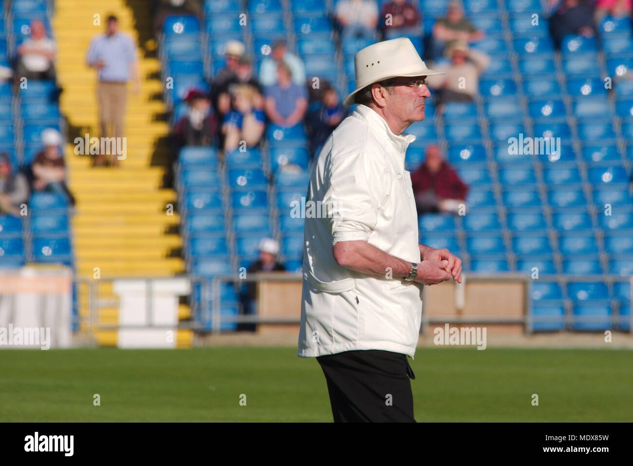 Leeds, England, 20 April 2018. Nick Cook umpiring in the Yorkshire against Nottinghamshire county championship match at Emerald Headingley, Leeds. Credit: Colin Edwards/Alamy Live News. Stock Photo
