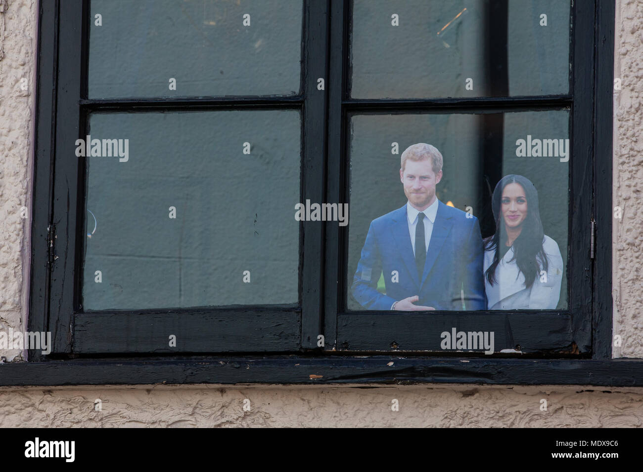 Windsor, UK. 20th April, 2018. A number of cutout figures of Prince Harry and Meghan Markle have appeared in windows around Windsor as preparations continue for the royal wedding next month. Credit: Mark Kerrison/Alamy Live News Stock Photo