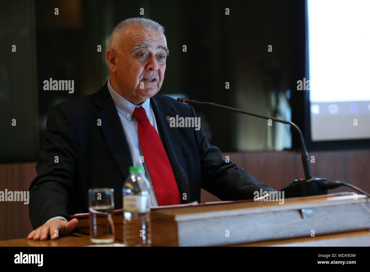 Athens, Greece. 19th Apr, 2018. Fotis Provatas, President of the Chamber of  Greek-Chinese Economic Cooperation, delivers a speech at a symposium under  the theme 