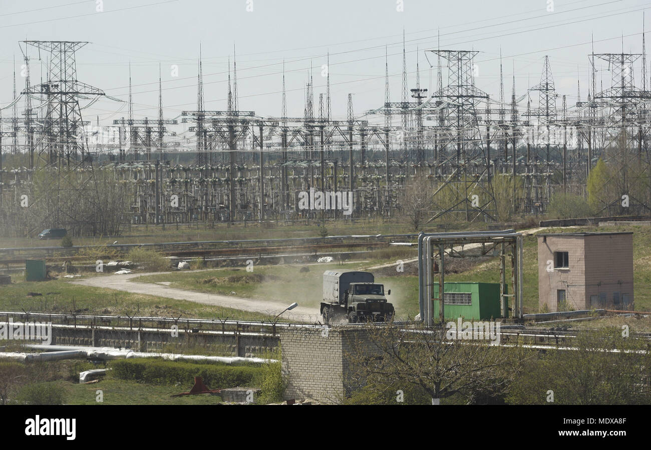 Kiev, Ukraine. 20th Apr, 2018. A car transits along a road in front of ...