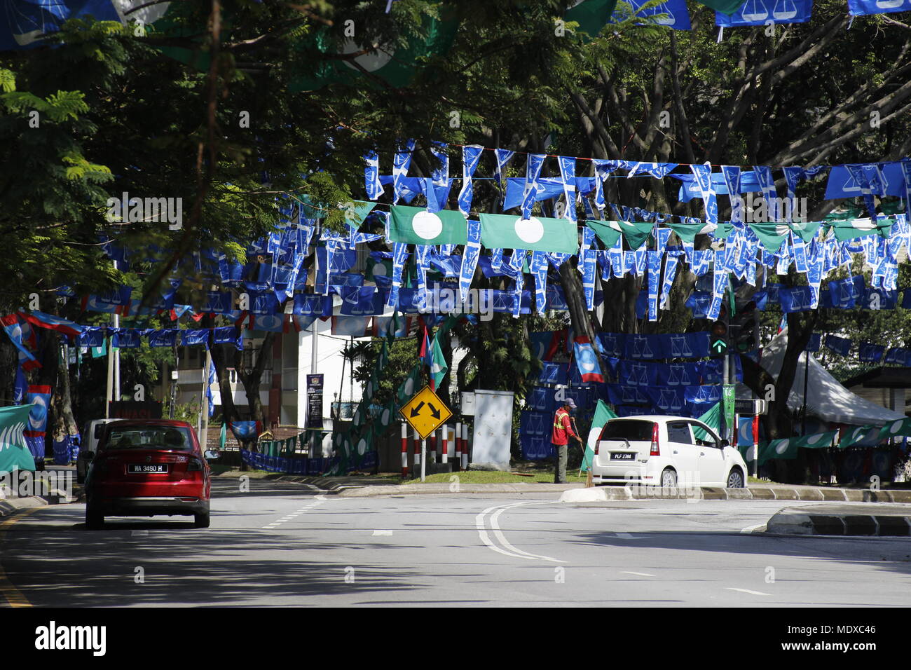 Kuala Lumpur, Malaysia. 21st April, 2018. The upcoming May 2018 general elections is expected to be a keenly contested fight between the ruling coalition party and the opposition alliance. Flags of the political parties can be seen decorating the roads in Kuala Lumpur. Credit: Beaconstox/Alamy Live News. Stock Photo