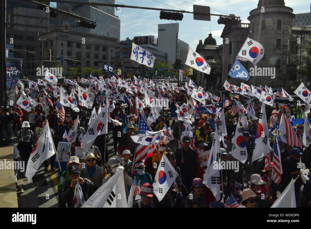 Seoul rally against President Moon Jae-in and for release of Park Gyeun-hye. Calling for declaration of war against North Korea and for the US to strengthen their alliance with South Korea. 21st April 2018 Stock Photo