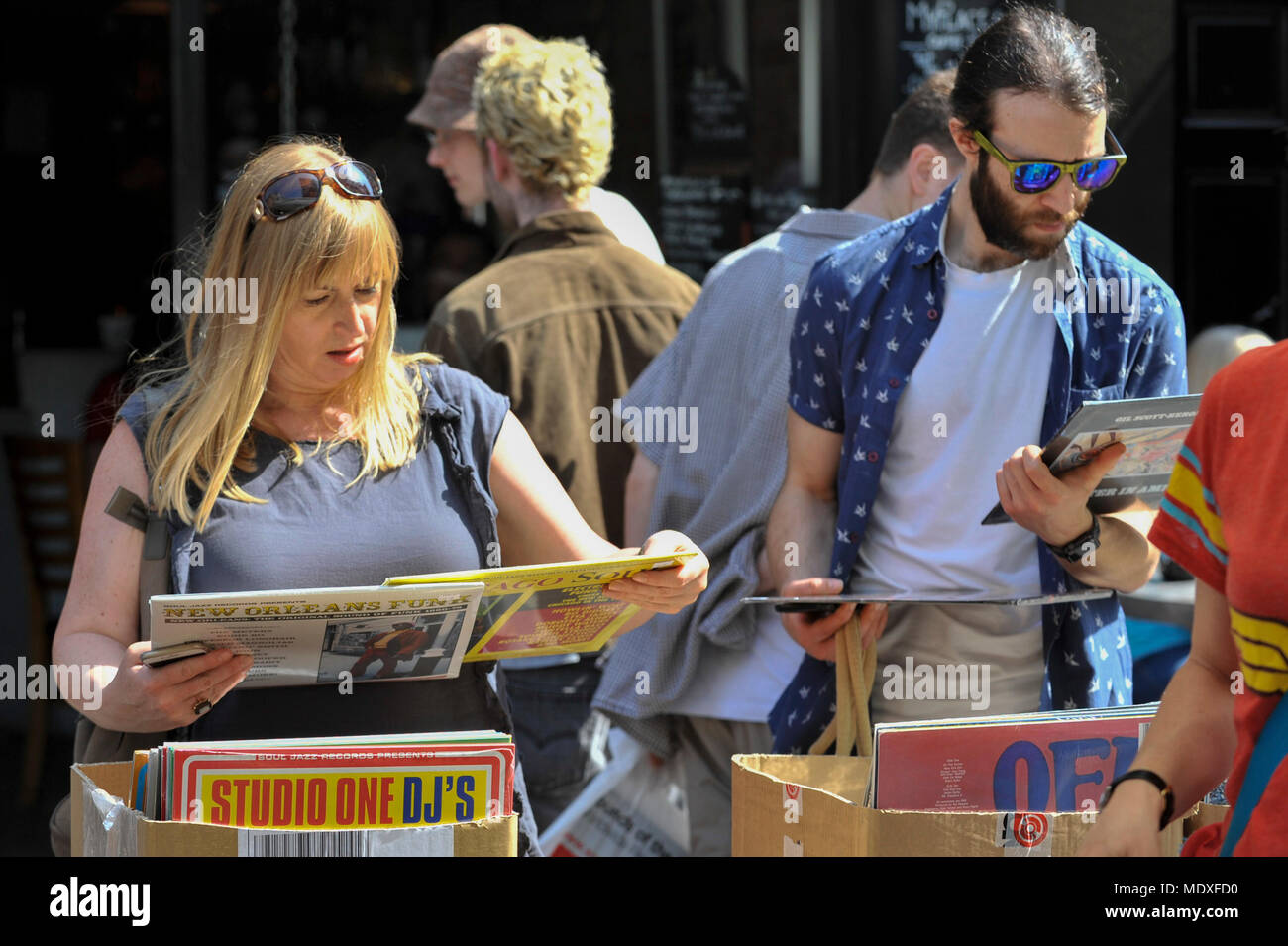 London, UK.  21 April 2018.  Music lovers browse at an analogue music stall in Soho on the 11th Record Store Day.  Over 200 independent record shops across the UK come together annually to celebrate the unique culture of analogue music with special vinyl releases made exclusively for the day. Credit: Stephen Chung / Alamy Live News Stock Photo