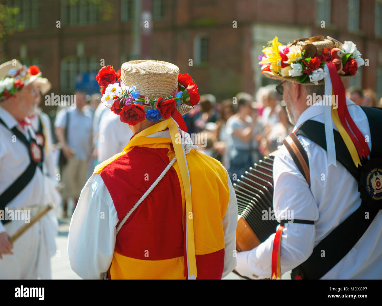 Morris dancing and festivities at the St. George's Day celebrations in Orton Square in Leicester city's Cultural Quarter. Stock Photo