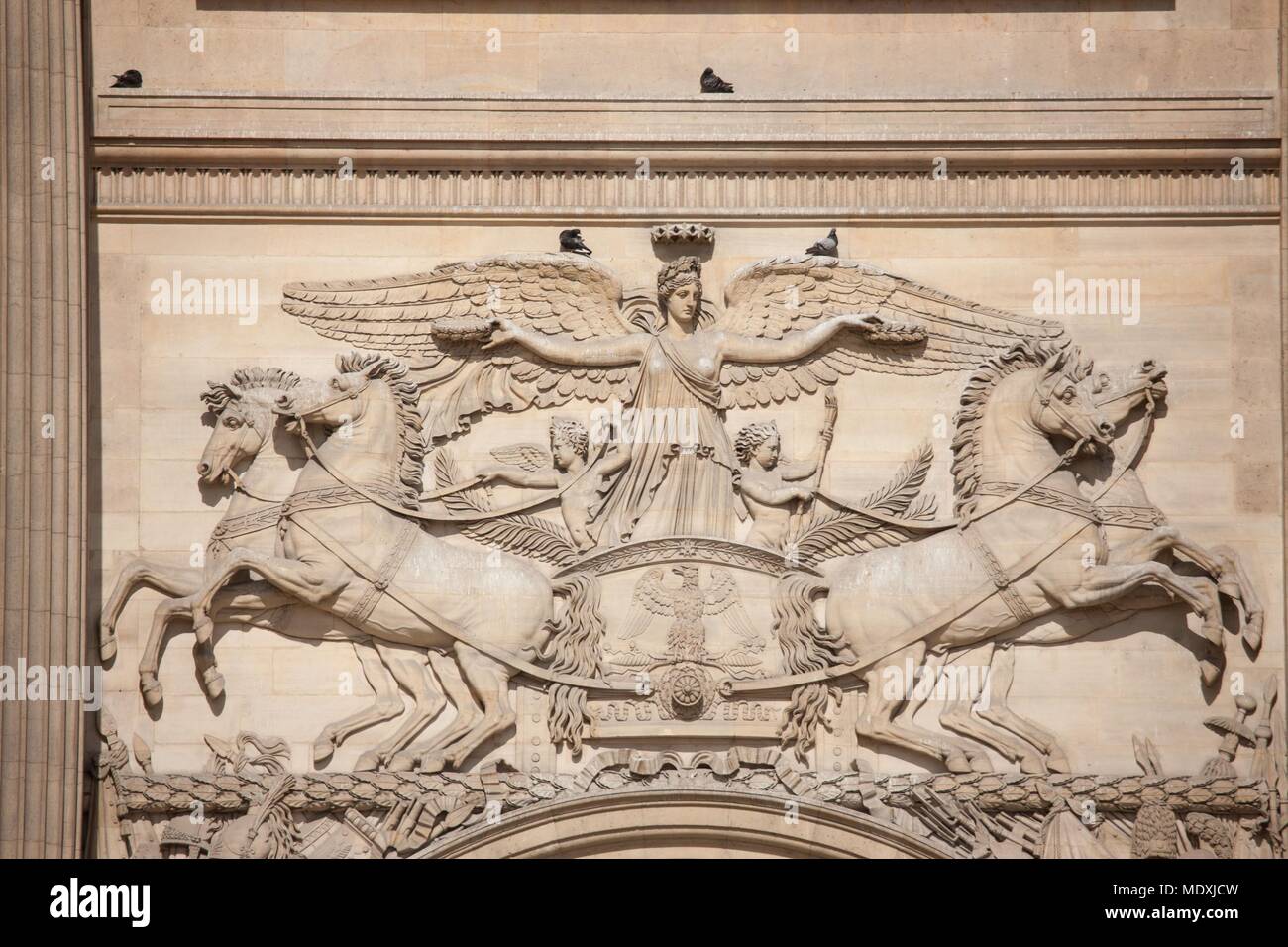 Paris, musée du Louvre, Perrault's Colonnade, architect Claude Perrault, detail gate, Napoleon I, relief, Stock Photo