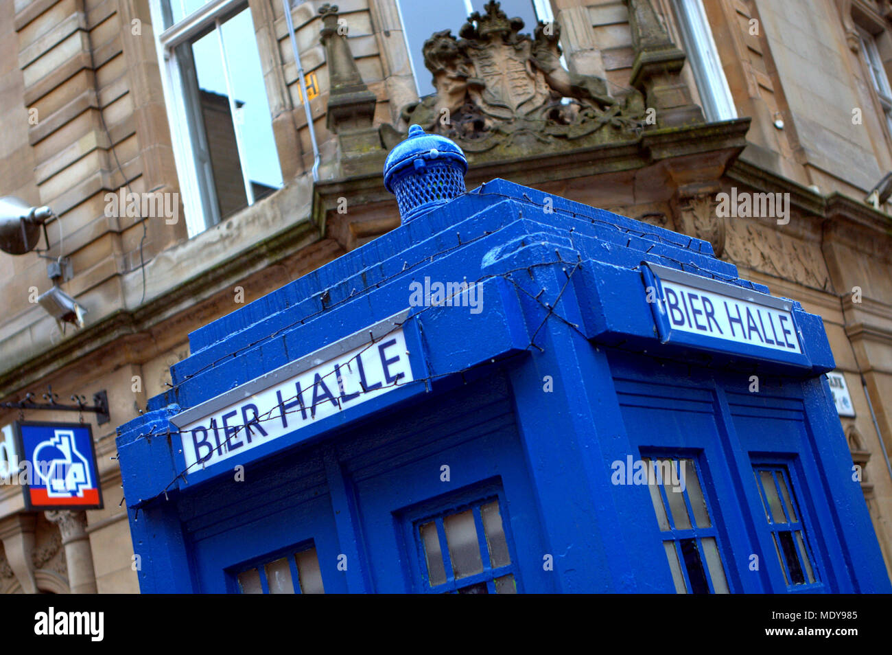 the worlds smallest beer hall ? beir halle a mock up of the tardis blue police box outside the site of new ivy restaurant Buchanan Street, Glasgow, UK Stock Photo