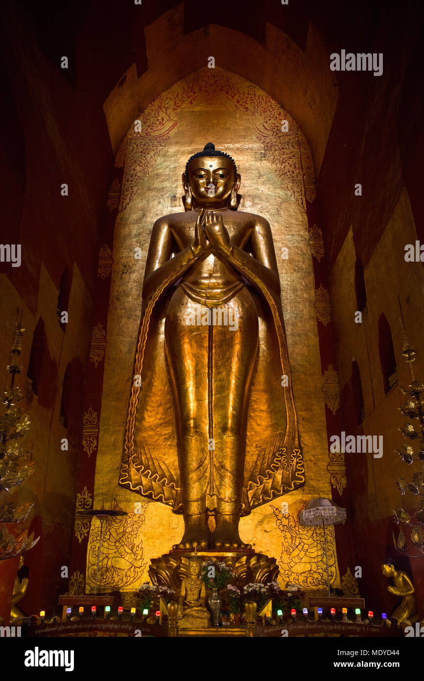 One of the four Buddha statues ('Kassapa', south facing) inside the 'Ananda Temple'. Bagan, Myanmar (Burma). Stock Photo
